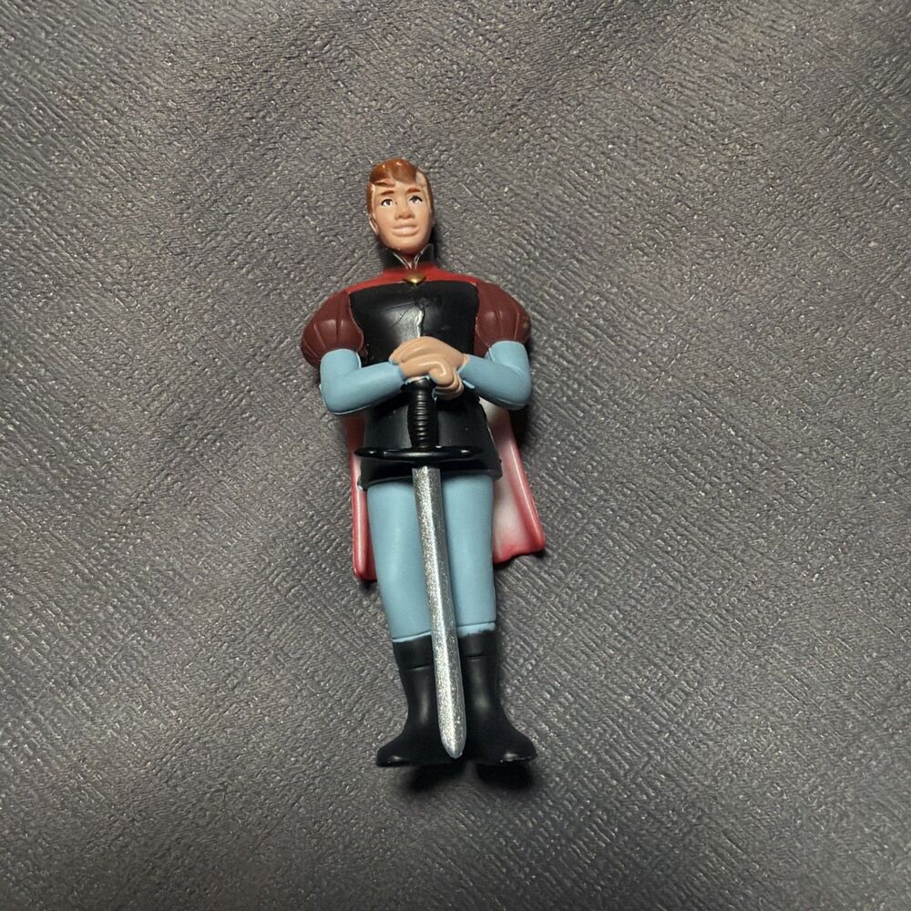 This is a Prince Phillip PVC action figure from Sleeping Beauty -L